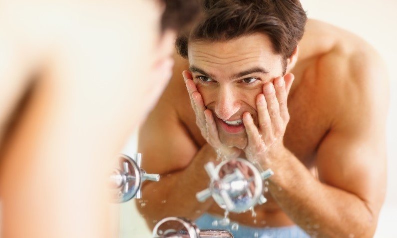 Man washing skin